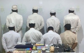 السعودية.. ضبط (8) مقيمين لترويجهم لحملات عمرة وهمية