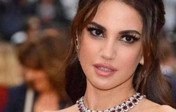 شاهد.. إطلالة مثيرة للفنانة درة بفستان مكشوف وتاتو