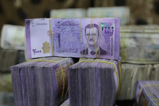 مؤسسات التمويل الدولية تكشف أسباب انهيار الاقتصاد السورى.. تعرف عليها مؤسسات التمويل الدولية تكشف أسباب انهيار الاقتصاد السورى.. تعرف عليها