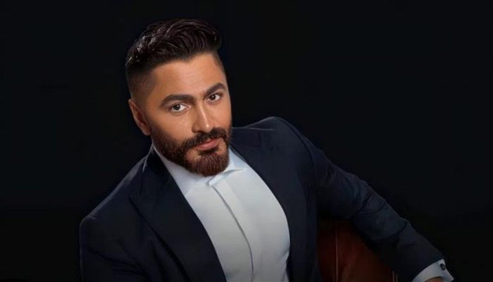 تامر حسني يكشف حقيقة الوشم المرتبط ببسمة بوسيل: "هي في دمي ومقدرش أقسى عليها" تامر حسني يكشف حقيقة الوشم المرتبط ببسمة بوسيل: "هي في دمي ومقدرش أقسى عليها"