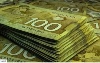 الدولار الكندي يهبط أمام الدولار الأمريكي